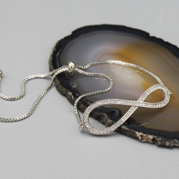 Jewelry bracelet infinity style white gold tone with stones sparkly adjustable - Picture 2 of 8